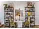 Elegant dining area featuring stylish shelving, modern decor, and seating for two at 978 North Ne Ave # 107, Atlanta, GA 30306