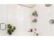 Shower boasts subway tile and convenient storage shelves for toiletries at 978 North Ne Ave # 107, Atlanta, GA 30306