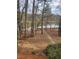 Quiet walkway to the lake, surrounded by trees at 261 Quail Run, Roswell, GA 30076