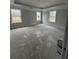 Spacious bedroom with tray ceiling and three large windows at 3030 Fairway Dr, Villa Rica, GA 30180