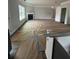 Large living room with fireplace awaiting its finishing touches at 3030 Fairway Dr, Villa Rica, GA 30180