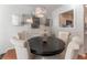 Elegant dining room with modern light fixture and decor at 111 Swanton Hill Ct, Decatur, GA 30030
