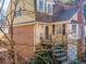 View of exterior elevation with brick and siding accents, steps to front door at 111 Swanton Hill Ct, Decatur, GA 30030