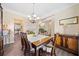 Formal dining room with hardwood floors and view of kitchen at 1107 Silverbrooke Dr, Powder Springs, GA 30127