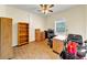 Well-lit office features a ceiling fan and vinyl plank flooring at 1927 Streamlet Xing, Kennesaw, GA 30152