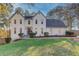 White two-story house with landscaping at 3782 Brookside Pkwy, Decatur, GA 30034