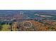 Scenic aerial view of a charming home in an autumn forest at 49 Holly Springs Ne Rd, White, GA 30184