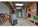 Spacious unfinished basement area showing exposed ceiling, storage, and potential for customization at 49 Holly Springs Ne Rd, White, GA 30184