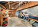 Unfinished basement with workbench and exposed ceiling, offering ample space for hobbies or storage at 49 Holly Springs Ne Rd, White, GA 30184