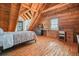 Bedroom with wood floors, natural light, wood walls, and vaulted ceilings at 49 Holly Springs Ne Rd, White, GA 30184