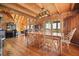Charming dining room area with hardwood floors and views of the living room at 49 Holly Springs Ne Rd, White, GA 30184