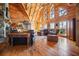 Spacious living room with vaulted ceilings, ample natural light, and stylish decor at 49 Holly Springs Ne Rd, White, GA 30184