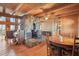 Living room and dining area with hardwood floors, vaulted ceilings and a stone fireplace at 49 Holly Springs Ne Rd, White, GA 30184