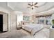 Bright bedroom featuring a king-size bed and virtually staged furnishings at 2725 Monet Dr, Cumming, GA 30041