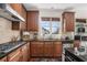 Kitchen with granite countertops and stainless steel appliances at 2725 Monet Dr, Cumming, GA 30041