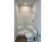 Bathroom features include a standing shower with an updated toilet and flooring at 504 Overlook Rd, Covington, GA 30052