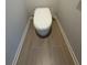 Modern bathroom with a toilet and tiled floors at 504 Overlook Rd, Covington, GA 30052