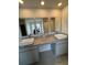 Bathroom with dual vanity featuring granite countertops and vessel sinks at 504 Overlook Rd, Covington, GA 30052
