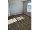Well-lit bedroom with neutral walls and carpet at 504 Overlook Rd, Covington, GA 30052