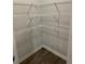 Walk-in closet with three rows of metal wire shelving at 504 Overlook Rd, Covington, GA 30052