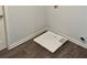 Laundry room with wooden floors and a white utility sink at 504 Overlook Rd, Covington, GA 30052