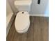 Close-up of an elongated toilet in a bathroom at 504 Overlook Rd, Covington, GA 30052