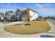 Two-story house with stone accents and a landscaped yard at 104 Avery Landing Way, Canton, GA 30115