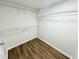 Walk-in closet with wire shelving at 245 Amal Sw Dr # 1008, Atlanta, GA 30315