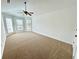 Bright bedroom with large windows and neutral carpet at 1873 Jameson Cir, Lawrenceville, GA 30043