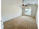 Inviting bedroom with neutral carpet and natural light at 1873 Jameson Cir, Lawrenceville, GA 30043