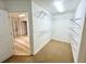 Spacious walk-in closet with custom shelving at 1873 Jameson Cir, Lawrenceville, GA 30043