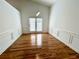Cozy dining area featuring wainscoting and hardwood floors at 1873 Jameson Cir, Lawrenceville, GA 30043