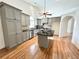 Kitchen with gray cabinets, stainless steel appliances, and a granite island at 1873 Jameson Cir, Lawrenceville, GA 30043