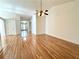 Bright living room with hardwood floors and a ceiling fan at 1873 Jameson Cir, Lawrenceville, GA 30043