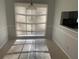 Bright breakfast nook with natural light and neutral tile flooring at 229 Smithstone Path, Fayetteville, GA 30214