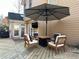 Outdoor deck with patio furniture and umbrella at 1025 Charleston Trce, Roswell, GA 30075