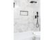 Bathroom featuring a shower stall with white marble style tile at 413 Cranfill Se Rd, Marietta, GA 30060