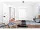 Neutral bedroom featuring an open closet and gray color scheme, and contemporary decor for relaxing retreat at 413 Cranfill Se Rd, Marietta, GA 30060