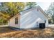 A view of the white painted exterior and the side yard at 413 Cranfill Se Rd, Marietta, GA 30060