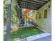 Backyard with lower level staircase, a slide, and hammock at 27 Danbury Hill # Coweta, Sharpsburg, GA 30277