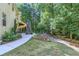 Backyard featuring a slide from the deck and a grassy yard at 27 Danbury Hill # Coweta, Sharpsburg, GA 30277