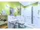 Bright bathroom features tiled shower and colorful mosaic accents at 27 Danbury Hill # Coweta, Sharpsburg, GA 30277