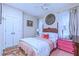 Bedroom with a patterned rug and bright-colored accents at 27 Danbury Hill # Coweta, Sharpsburg, GA 30277
