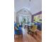 Formal dining room with hardwood floors, bay window, and elegant chandelier at 27 Danbury Hill # Coweta, Sharpsburg, GA 30277