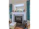 Close up of a fireplace featuring decorative elements and vintage decor at 27 Danbury Hill # Coweta, Sharpsburg, GA 30277