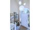 Bright foyer with artwork, pendant lighting and tiled floors at 27 Danbury Hill # Coweta, Sharpsburg, GA 30277