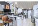 Spacious kitchen with bar seating, stainless appliances, and modern finishes at 27 Danbury Hill # Coweta, Sharpsburg, GA 30277