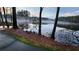 Scenic lake view with fog and trees reflecting in the water, creating a serene and picturesque landscape at 27 Danbury Hill # Coweta, Sharpsburg, GA 30277
