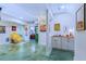 Spacious living area with painted concrete floors and eclectic decor at 27 Danbury Hill # Coweta, Sharpsburg, GA 30277