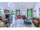 Stylish living room with hardwood floors, fireplace and views of the backyard at 27 Danbury Hill # Coweta, Sharpsburg, GA 30277